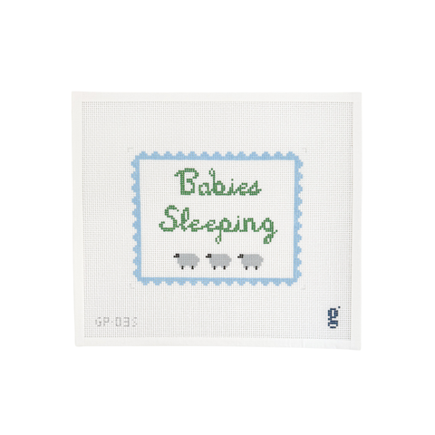 Babies Sleeping needlepoint canvas with three sheep and blue scalloped border